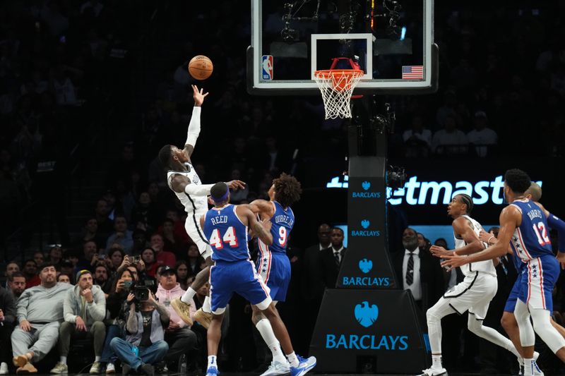 BROOKLYN, NY - MARCH 5: Dennis Schroder #17 of the Brooklyn Nets drives to the basket during the game against the Philadelphia 76ers on March 5, 2024 at Barclays Center in Brooklyn, New York. NOTE TO USER: User expressly acknowledges and agrees that, by downloading and or using this Photograph, user is consenting to the terms and conditions of the Getty Images License Agreement. Mandatory Copyright Notice: Copyright 2024 NBAE (Photo by Jesse D. Garrabrant/NBAE via Getty Images)