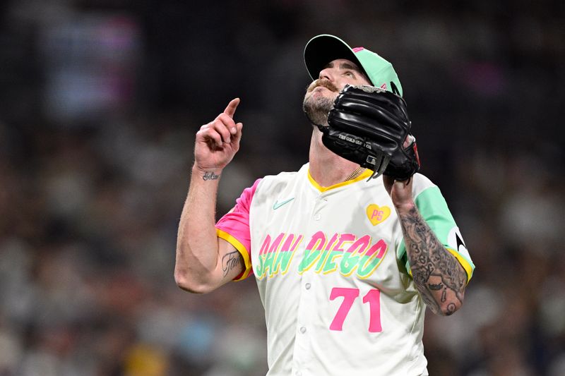 Jul 12, 2024; San Diego, California, USA; San Diego Padres relief pitcher Logan Gillaspie (71) celebrated after pitching the top of the eighth inning against the Atlanta Braves at Petco Park. Mandatory Credit: Orlando Ramirez-USA TODAY Sports 