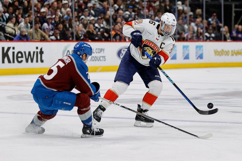 Jan 6, 2024; Denver, Colorado, USA; Florida Panthers center Aleksander Barkov (16) plays the puck past Colorado Avalanche right wing Logan O'Connor (25) in the third period at Ball Arena. Mandatory Credit: Isaiah J. Downing-USA TODAY Sports