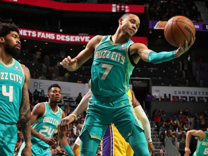 CHARLOTTE, NC - FEBRUARY 5: Bryce McGowans #7 of the Charlotte Hornets grabs a rebound during the game against the Los Angeles Lakers on February 5, 2024 at Spectrum Center in Charlotte, North Carolina. NOTE TO USER: User expressly acknowledges and agrees that, by downloading and or using this photograph, User is consenting to the terms and conditions of the Getty Images License Agreement. Mandatory Copyright Notice: Copyright 2024 NBAE (Photo by Kent Smith/NBAE via Getty Images)