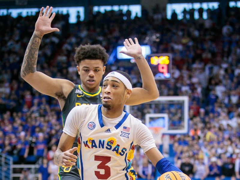 Feb 18, 2023; Lawrence, Kansas, USA; Kansas Jayhawks guard Dajuan Harris Jr. (3) drives to the basket against the Baylor Bears during the second half at Allen Fieldhouse. Mandatory Credit: William Purnell-USA TODAY Sports