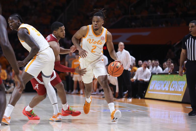 Mar 1, 2025; Knoxville, Tennessee, USA; Tennessee Volunteers guard Chaz Lanier (2) moves the ball against the Alabama Crimson Tide during the first half at Thompson-Boling Arena at Food City Center. Mandatory Credit: Randy Sartin-Imagn Images