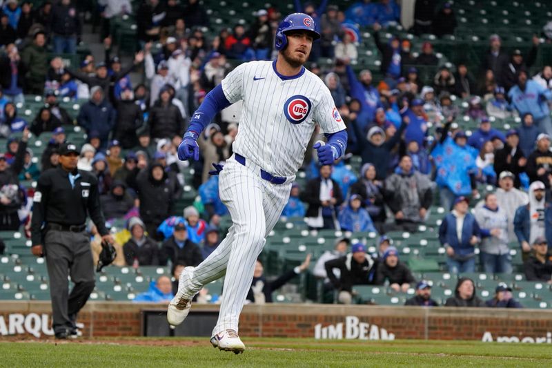 Apr 7, 2024; Chicago, Illinois, USA; Chicago Cubs outfielder Cody Bellinger (24) hits a home run against the Los Angeles Dodgers during the sixth inning at Wrigley Field. Mandatory Credit: David Banks-USA TODAY Sports