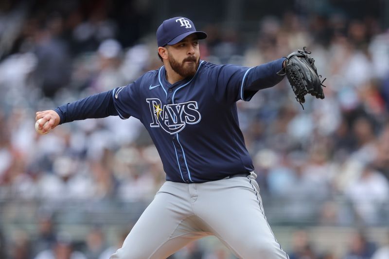 Apr 21, 2024; Bronx, New York, USA; Tampa Bay Rays starting pitcher Aaron Civale (34) pitches against the New York Yankees during the first inning at Yankee Stadium. Mandatory Credit: Brad Penner-USA TODAY Sports