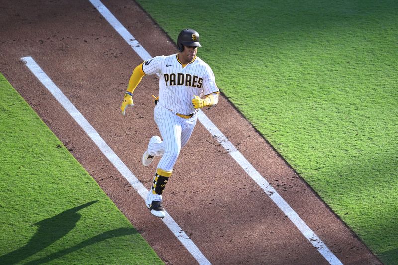 Jun 24, 2023; San Diego, California, USA; San Diego Padres left fielder Juan Soto (22) runs to first base after hitting a single against the Washington Nationals during the third inning at Petco Park. Mandatory Credit: Orlando Ramirez-USA TODAY Sports