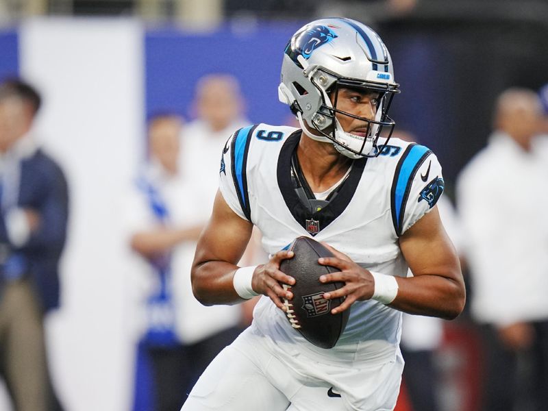 Carolina Panthers quarterback Bryce Young (9) scrambles during an NFL pre-season football game against the New York Giants on Friday, Aug. 18, 2023, in East Rutherford, N.J. (AP Photo/Rusty Jones)