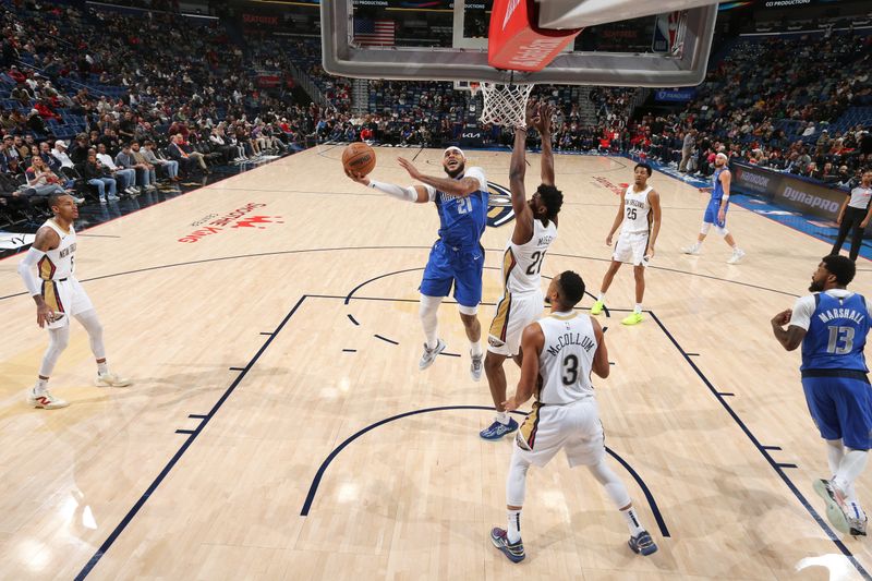 NEW ORLEANS, LA - JANUARY 15:  Daniel Gafford #21 of the Dallas Mavericks drives to the basket during the game against the New Orleans Pelicans on January 15, 2025 at the Smoothie King Center in New Orleans, Louisiana. NOTE TO USER: User expressly acknowledges and agrees that, by downloading and or using this Photograph, user is consenting to the terms and conditions of the Getty Images License Agreement. Mandatory Copyright Notice: Copyright 2025 NBAE (Photo by Layne Murdoch Jr./NBAE via Getty Images)