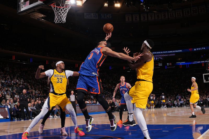 NEW YORK, NY - FEBRUARY 10: Josh Hart #3 of the New York Knicks rebounds the ball during the game against the Indiana Pacers on February 10, 2024 at Madison Square Garden in New York City, New York.  NOTE TO USER: User expressly acknowledges and agrees that, by downloading and or using this photograph, User is consenting to the terms and conditions of the Getty Images License Agreement. Mandatory Copyright Notice: Copyright 2024 NBAE  (Photo by Jesse D. Garrabrant/NBAE via Getty Images)