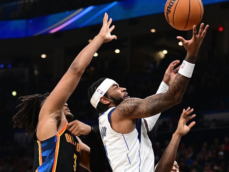 OKLAHOMA CITY, OKLAHOMA - NOVEMBER 17: Jaden Hardy #1 of the Dallas Mavericks goes the rim during the second half against the Oklahoma City Thunder at Paycom Center on November 17, 2024 in Oklahoma City, Oklahoma. NOTE TO USER: User expressly acknowledges and agrees that, by downloading and or using this photograph, User is consenting to the terms and conditions of the Getty Images License Agreement. (Photo by Joshua Gateley/Getty Images)