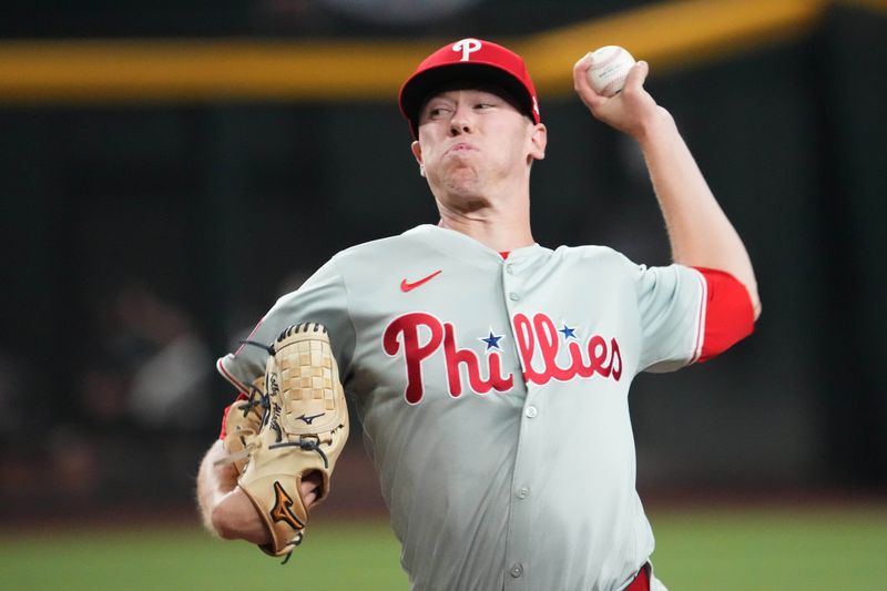 Aug 8, 2024; Phoenix, Arizona, USA; Philadelphia Phillies pitcher Kolby Allard (49) pitches against the Arizona Diamondbacks during the first inning at Chase Field. Mandatory Credit: Joe Camporeale-USA TODAY Sports