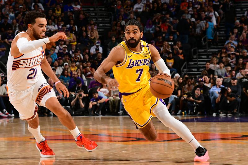 PHOENIX, AZ - OCTOBER 17: Gabe Vincent #7 of the Los Angeles Lakers drives to the basket during the game against the Phoenix Suns on October 17, 2024 at Footprint Center in Phoenix, Arizona. NOTE TO USER: User expressly acknowledges and agrees that, by downloading and or using this photograph, user is consenting to the terms and conditions of the Getty Images License Agreement. Mandatory Copyright Notice: Copyright 2024 NBAE (Photo by Kate Frese/NBAE via Getty Images)