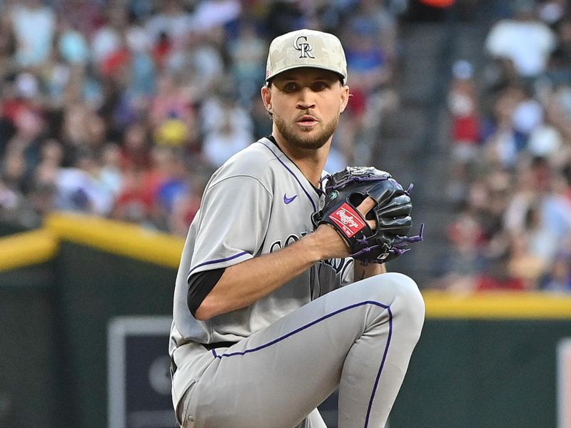 May 16, 2025; Phoenix, Arizona, USA;  Colorado Rockies pitcher Carson Palmquist (45) throws in his MLB debut in the first inning against the Arizona Diamondbacks at Chase Field. Mandatory Credit: Matt Kartozian-Imagn Images