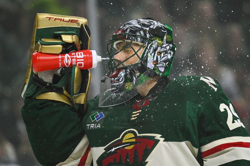 Apr 11, 2023; Saint Paul, Minnesota, USA;  Minnesota Wild goalie Marc-Andre Fleury (29) has a drink against the Winnipeg Jets during the first period at at Xcel Energy Center. Mandatory Credit: Nick Wosika-USA TODAY Sports