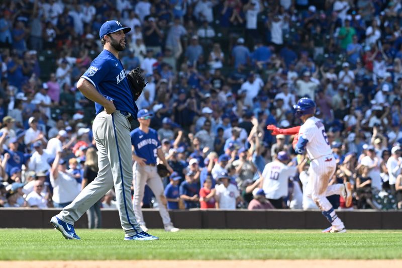 Aug 20, 2023; Chicago, Illinois, USA; Kansas City Royals starting pitcher Jordan Lyles (24) sticks out his tongue as Chicago Cubs catcher Miguel Amaya (6) rounds the bases after hitting a home run during the eighth inning at Wrigley Field. Mandatory Credit: Matt Marton-USA TODAY Sports