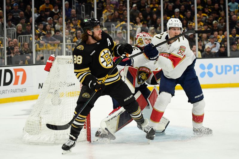 May 17, 2024; Boston, Massachusetts, USA; Boston Bruins right wing David Pastrnak (88) and Florida Panthers defenseman Niko Mikkola (77) battle in front of goaltender Sergei Bobrovsky (72) during the first period in game six of the second round of the 2024 Stanley Cup Playoffs at TD Garden. Mandatory Credit: Bob DeChiara-USA TODAY Sports