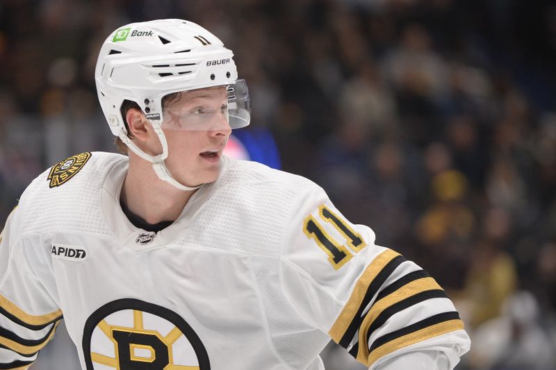 Feb 24, 2024; Vancouver, British Columbia, CAN;  Boston Bruins forward Trent Frederic (11) awaits the puck drop during the second period Vancouver Canucks at Rogers Arena. Mandatory Credit: Anne-Marie Sorvin-USA TODAY Sports