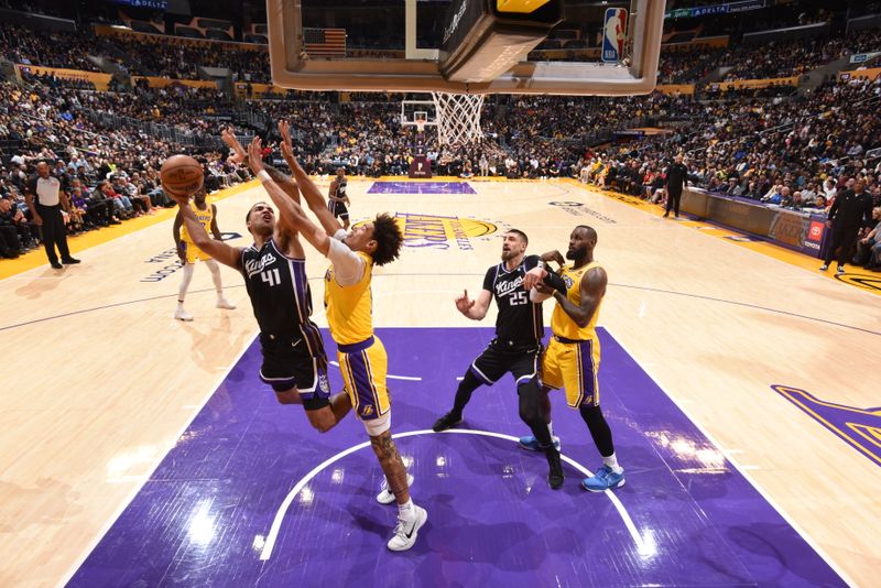 LOS ANGELES, CA - MARCH 6: Trey Lyles #41 of the Sacramento Kings drives to the basket during the game against the Los Angeles Lakers on March 6, 2024 NBAE at Crypto.Com Arena in Los Angeles, California. NOTE TO USER: User expressly acknowledges and agrees that, by downloading and/or using this Photograph, user is consenting to the terms and conditions of the Getty Images License Agreement. Mandatory Copyright Notice: Copyright 2024 NBAE (Photo by Juan Ocampo/NBAE via Getty Images)