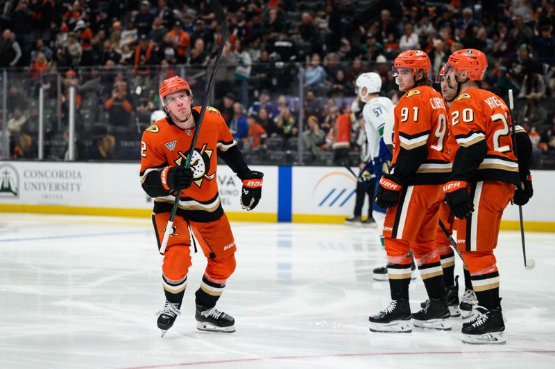 Nov 26, 2025; Anaheim, California, USA; Anaheim Ducks defenseman Jackson Lacombe (2) looks on after scoring during the second period against the Vancouver Canucks at Honda Center. Mandatory Credit: William Liang-Imagn Images