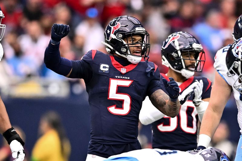 Houston Texans safety Jalen Pitre (5) reacts during an NFL football game against the Tennessee Titans, Sunday, Dec 31, 2023, in Houston. (AP Photo/Maria Lysaker)