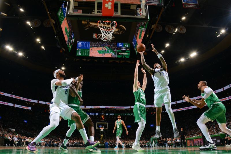 BOSTON, MA - JUNE 17: PJ Washington #25 of the Dallas Mavericks drives to the basket during the game against the Boston Celtics during Game 5 of the 2024 NBA Finals on June 17, 2024 at the TD Garden in Boston, Massachusetts. NOTE TO USER: User expressly acknowledges and agrees that, by downloading and or using this photograph, User is consenting to the terms and conditions of the Getty Images License Agreement. Mandatory Copyright Notice: Copyright 2024 NBAE  (Photo by Brian Babineau/NBAE via Getty Images)