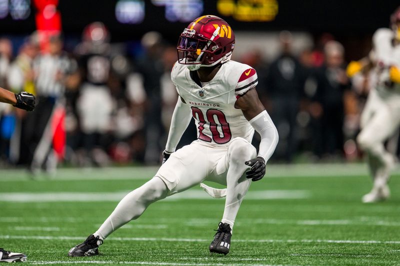 Washington Commanders safety Jartavius Martin (20) works during the second half of an NFL football game against the Atlanta Falcons, Sunday, Oct. 15, 2023, in Atlanta. The Washington Commanders won 24-16. (AP Photo/Danny Karnik)