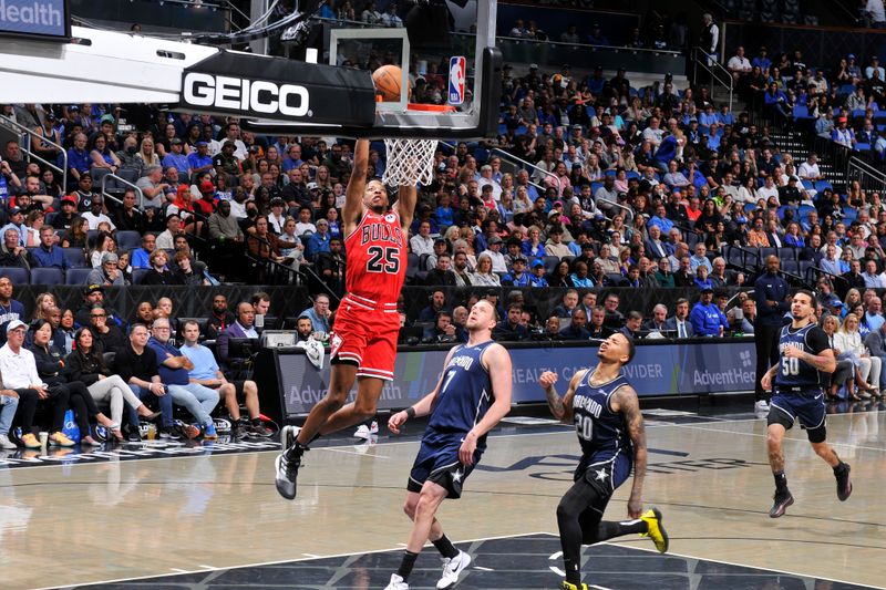 ORLANDO, FL - APRIL 7: Dalen Terry #25 of the Chicago Bulls dunks the ball during the game against the Orlando Magic on April 7, 2024 at the Kia Center in Orlando, Florida. NOTE TO USER: User expressly acknowledges and agrees that, by downloading and or using this photograph, User is consenting to the terms and conditions of the Getty Images License Agreement. Mandatory Copyright Notice: Copyright 2024 NBAE (Photo by Fernando Medina/NBAE via Getty Images)