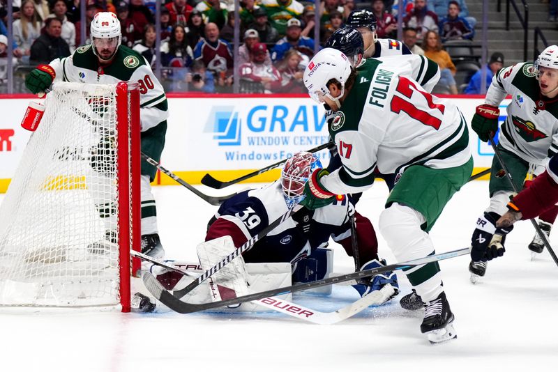 Feb 28, 2025; Denver, Colorado, USA; Colorado Avalanche goaltender Mackenzie Blackwood (39) makes a save on Minnesota Wild left wing Marcus Foligno (17) in the third period at Ball Arena. Mandatory Credit: Ron Chenoy-Imagn Images