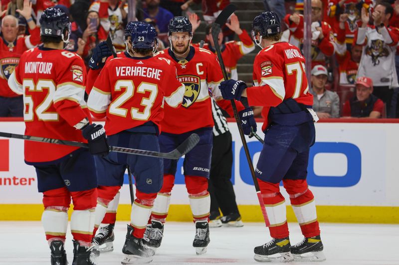 May 26, 2024; Sunrise, Florida, USA; Florida Panthers center Aleksander Barkov (16) celebrates with teammates after scoring against the New York Rangers during the third period in game three of the Eastern Conference Final of the 2024 Stanley Cup Playoffs at Amerant Bank Arena. Mandatory Credit: Sam Navarro-USA TODAY Sports