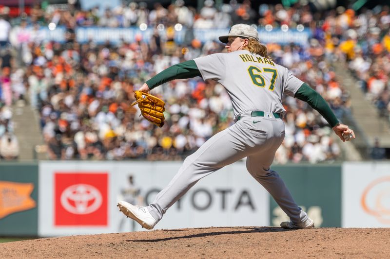 May 18, 2025; San Francisco, California, USA; Oakland Athletics pitcher Grant Holman (67) throws a pitch during the eighth inning against the San Francisco Giants at Oracle Park. Mandatory Credit: Bob Kupbens-Imagn Images