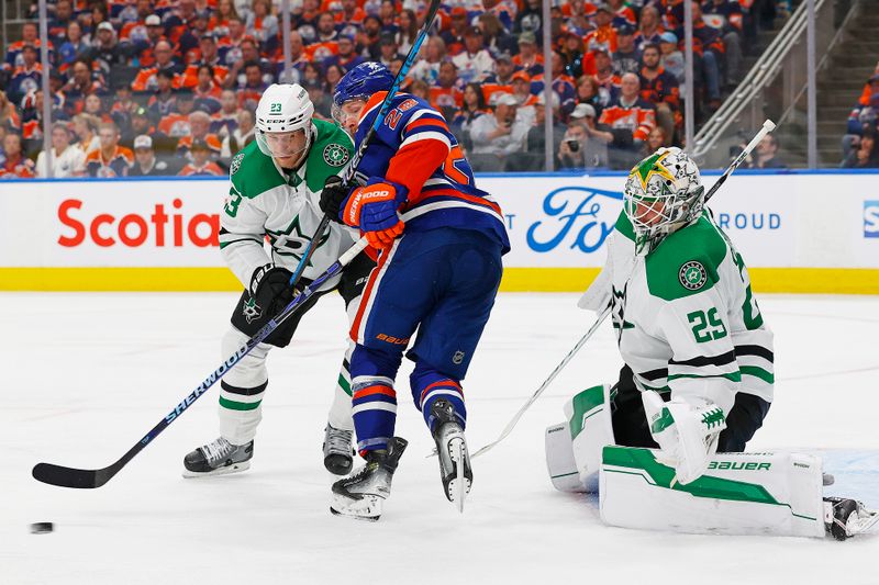 May 27, 2024; Edmonton, Alberta, CAN;   Edmonton Oilers forward Connor Brown (28) looks for a deflection in front of Dallas Stars goaltender Jake Oettinger (29) during the third period in game three of the Western Conference Final of the 2024 Stanley Cup Playoffs at Rogers Place. Mandatory Credit: Perry Nelson-USA TODAY Sports