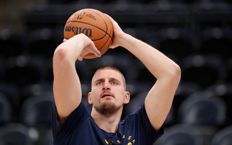 SALT LAKE CITY, UT - NOVEMBER 27:  Nikola Jokic #15 of the Denver Nuggets shoots during warmups before their game against the Utah Jazz at the Delta Center on November 27, 2024 in Salt Lake City, Utah.  NOTE TO USER: User expressly acknowledges and agrees that, by downloading and or using this photograph, User is consenting to the terms and conditions of the Getty Images License Agreement. (Photo by Chris Gardner/Getty Images)