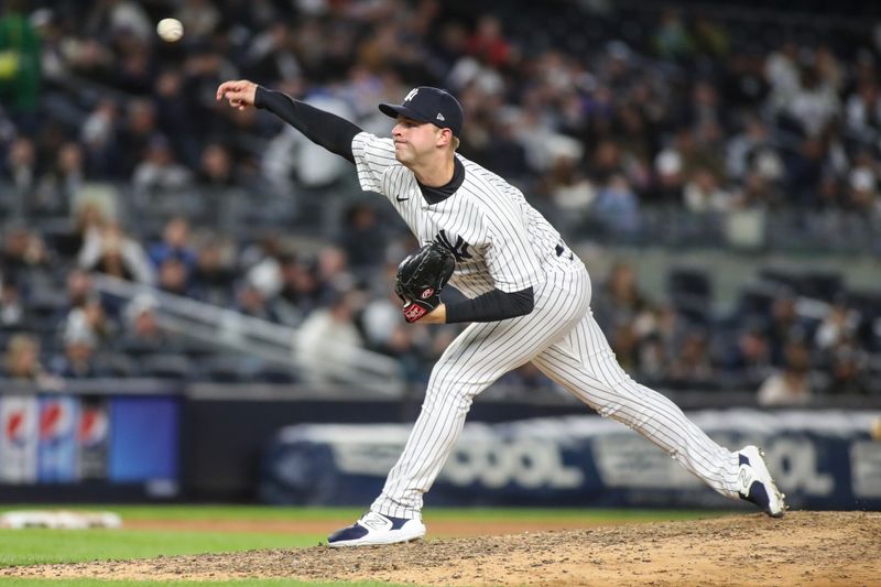 May 2, 2023; Bronx, New York, USA;  New York Yankees relief pitcher Michael King (34) pitches in the ninth inning against the Cleveland Guardians at Yankee Stadium. Mandatory Credit: Wendell Cruz-USA TODAY Sports