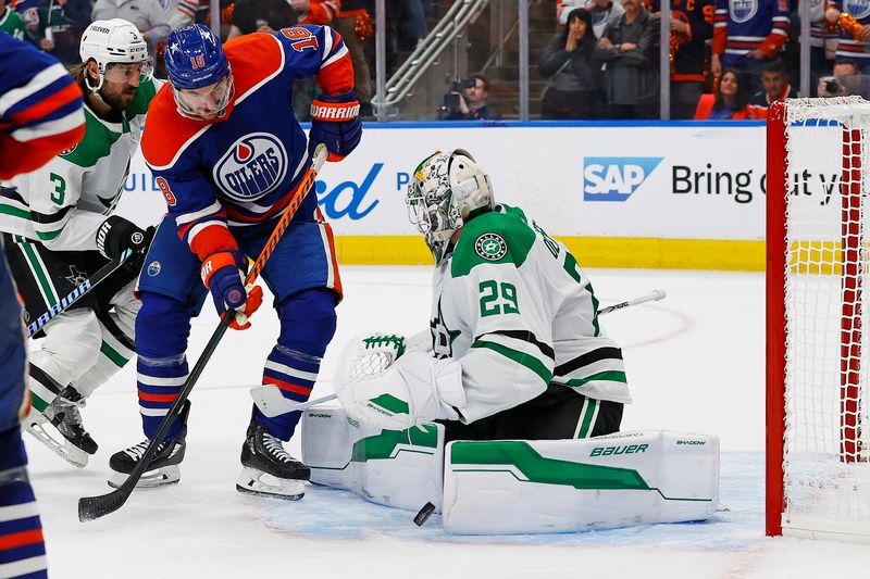 May 27, 2024; Edmonton, Alberta, CAN; Dallas Stars goaltender Jake Oettinger (29) makes a save on Edmonton Oilers forward Zach Hyman (18) during the third period in game three of the Western Conference Final of the 2024 Stanley Cup Playoffs at Rogers Place. Mandatory Credit: Perry Nelson-USA TODAY Sports