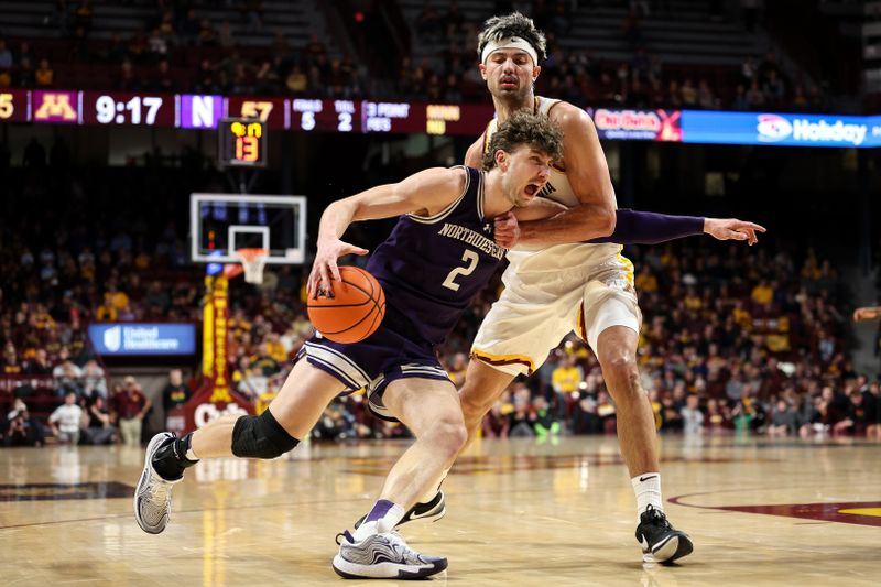 Feb 25, 2025; Minneapolis, Minnesota, USA; Northwestern Wildcats forward Nick Martinelli (2) works around Minnesota Golden Gophers forward Dawson Garcia (3) during the second half at Williams Arena. Mandatory Credit: Matt Krohn-Imagn Images