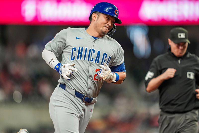 May 15, 2024; Cumberland, Georgia, USA; Chicago Cubs right fielder Seiya Suzuki (27) runs after hitting a home run against the Atlanta Braves during the eighth inning at Truist Park. Mandatory Credit: Dale Zanine-USA TODAY Sports