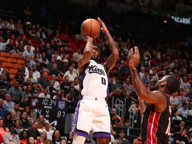 MIAMI, FL - NOVEMBER 4:  Malik Monk #0 of the Sacramento Kings shoots the ball during the game against the Miami Heat during a regular season game on November 4, 2024 at Kaseya Center in Miami, Florida. NOTE TO USER: User expressly acknowledges and agrees that, by downloading and or using this Photograph, user is consenting to the terms and conditions of the Getty Images License Agreement. Mandatory Copyright Notice: Copyright 2024 NBAE (Photo by Issac Baldizon/NBAE via Getty Images)