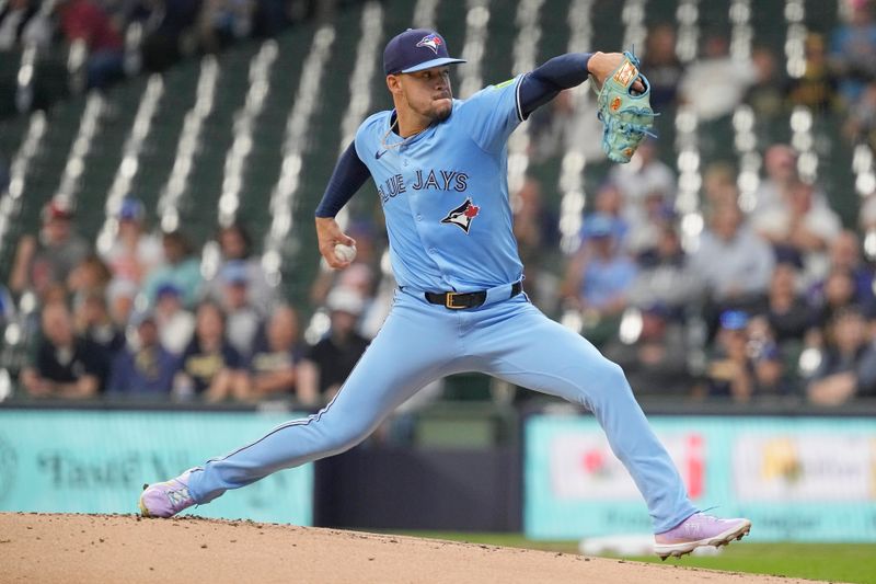 Jun 10, 2024; Milwaukee, Wisconsin, USA;  Toronto Blue Jays pitcher Jose Berrios (17) throws a pitch during the first inning against the Milwaukee Brewers at American Family Field. Mandatory Credit: Jeff Hanisch-USA TODAY Sports