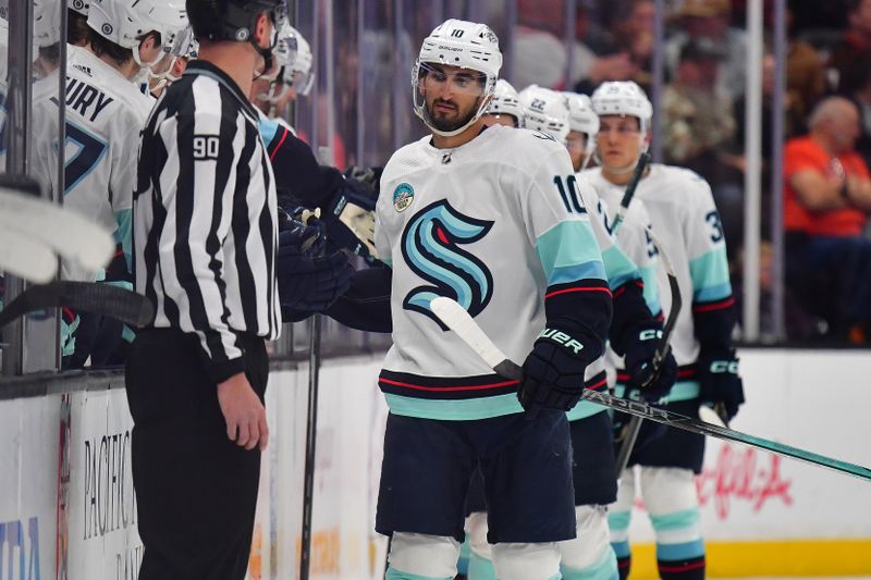 Apr 5, 2024; Anaheim, California, USA; Seattle Kraken center Matty Beniers (10) celebrates his goal scored against the Anaheim Ducks during the second period at Honda Center. Mandatory Credit: Gary A. Vasquez-USA TODAY Sports