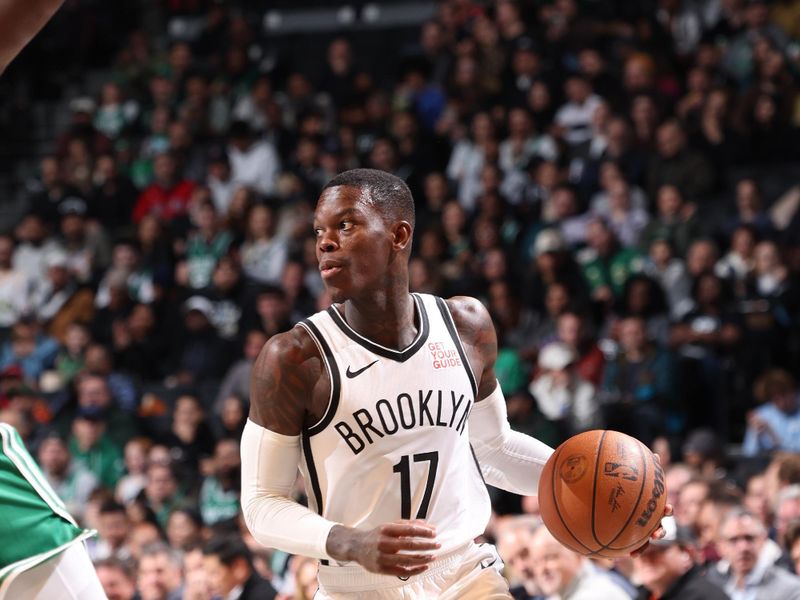 BROOKLYN, NY - NOVEMBER 13: Dennis Schroder #17 of the Brooklyn Nets dribbles the ball during the game against the Boston Celtics on November 13, 2024 at Barclays Center in Brooklyn, New York. NOTE TO USER: User expressly acknowledges and agrees that, by downloading and or using this Photograph, user is consenting to the terms and conditions of the Getty Images License Agreement. Mandatory Copyright Notice: Copyright 2024 NBAE (Photo by Jeff Haynes/NBAE via Getty Images)