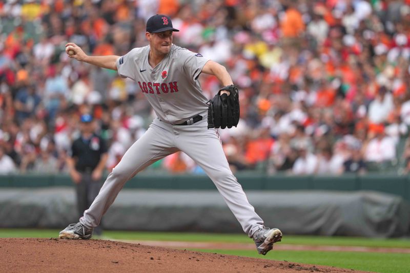 May 27, 2024; Baltimore, Maryland, USA; Boston Red Sox starting pitcher Cooper Criswell (64) delivers a pitch in the first inning against the Baltimore Orioles at Oriole Park at Camden Yards. Mandatory Credit: Mitch Stringer-USA TODAY Sports