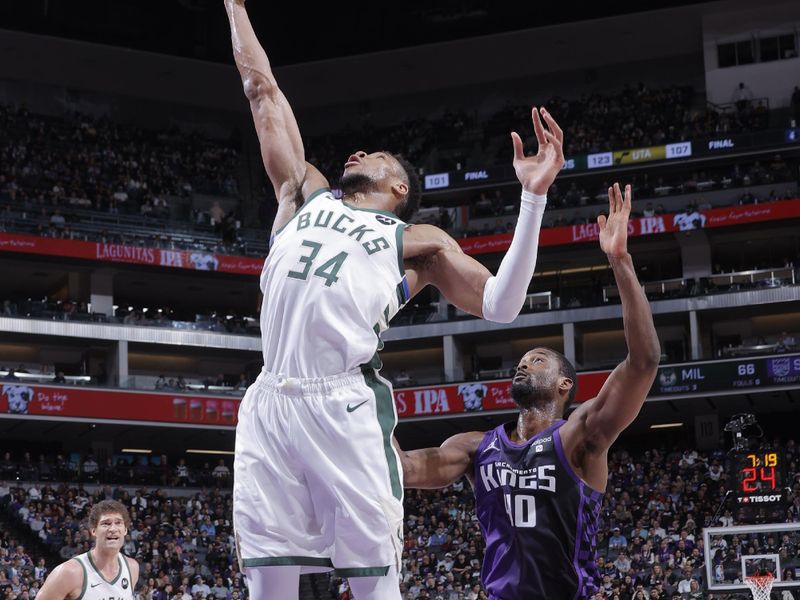 SACRAMENTO, CA - MARCH 12: Giannis Antetokounmpo #34 of the Milwaukee Bucks grabs a rebound during the game against the Sacramento Kings on March 12, 2024 at Golden 1 Center in Sacramento, California. NOTE TO USER: User expressly acknowledges and agrees that, by downloading and or using this Photograph, user is consenting to the terms and conditions of the Getty Images License Agreement. Mandatory Copyright Notice: Copyright 2024 NBAE (Photo by Rocky Widner/NBAE via Getty Images)