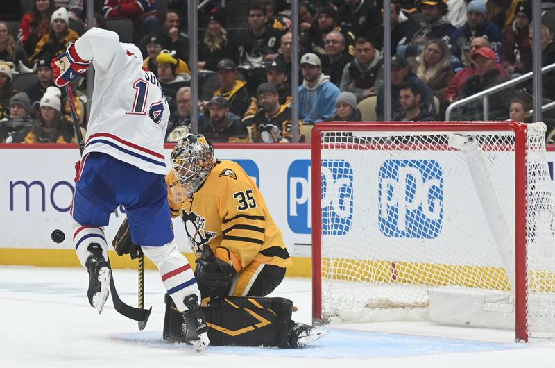 Dec 11, 2025; Pittsburgh, Pennsylvania, USA;  Pittsburgh Penguins goalie Tristan Jarry (35) stops Montreal Canadiens center Nick Suzuki (14) during the second period at PPG Paints Arena. Mandatory Credit: Philip G. Pavely-Imagn Images