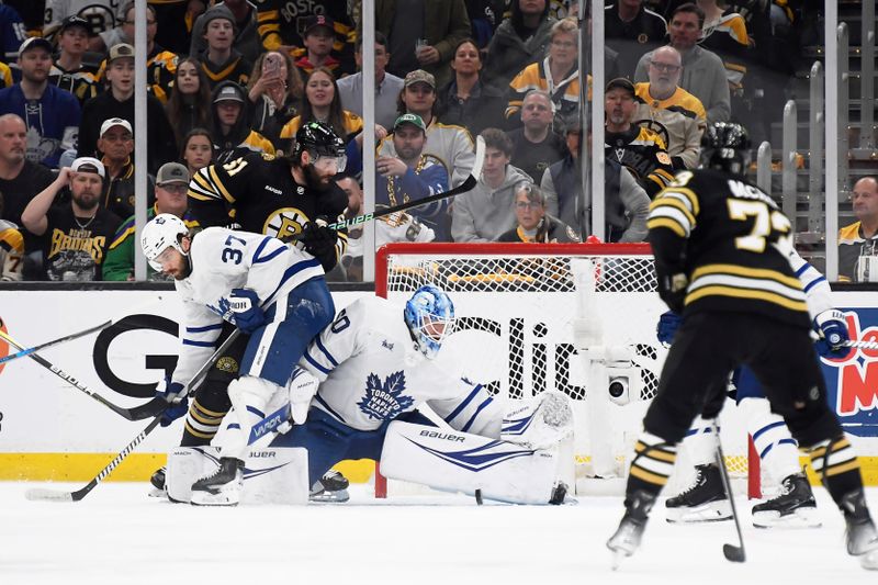 Apr 30, 2024; Boston, Massachusetts, USA; Toronto Maple Leafs goaltender Joseph Woll (60) makes a save while Boston Bruins left wing Pat Maroon (61) looks for a rebound during the second period in game five of the first round of the 2024 Stanley Cup Playoffs at TD Garden. Mandatory Credit: Bob DeChiara-USA TODAY Sports