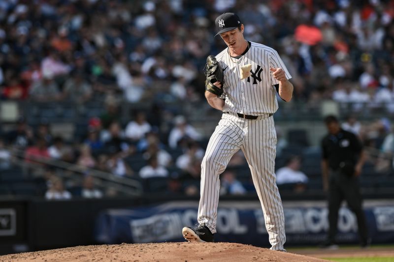 Jun 20, 2024; Bronx, New York, USA; New York Yankees pitcher Tim Hill (54) takes the mound during the fifth inning against the Baltimore Orioles at Yankee Stadium. Mandatory Credit: John Jones-USA TODAY Sports