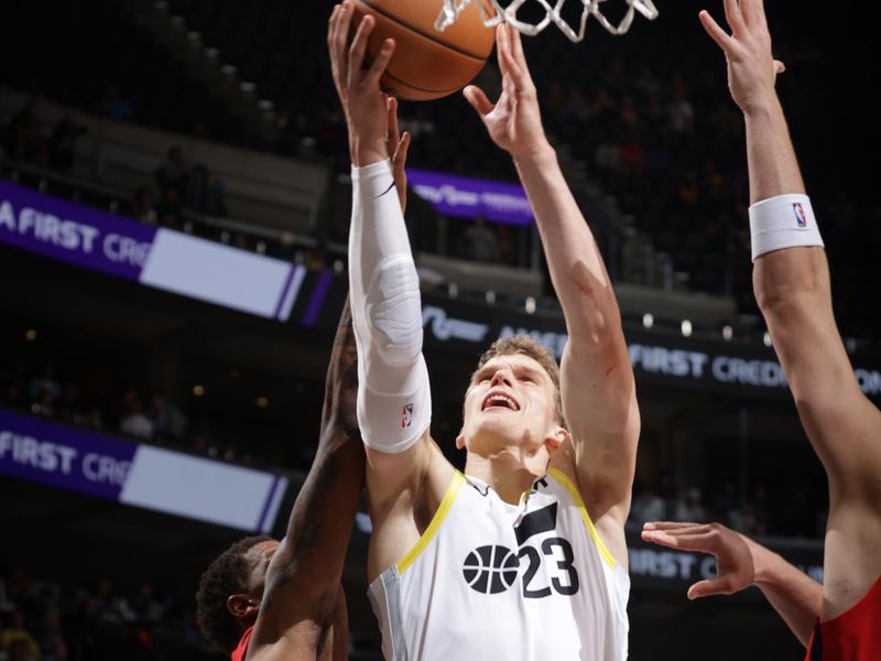 SALT LAKE CITY, UT - OCTOBER 7: Lauri Markkanen #23 of the Utah Jazz drives to the basket during the game against the Houston Rockets during a NBA preseason game on October 7, 2024 at the Delta Center in Salt Lake City, Utah. NOTE TO USER: User expressly acknowledges and agrees that, by downloading and or using this Photograph, User is consenting to the terms and conditions of the Getty Images License Agreement. Mandatory Copyright Notice: Copyright 2024 NBAE (Photo by Melissa Majchrzak/NBAE via Getty Images)