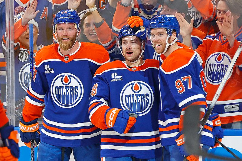 Oct 8, 2025; Edmonton, Alberta, CAN; The Edmonton Oilers celebrate a goal scored by forward Andrew Mangiapane (88) during the first period against the Calgary Flames at Rogers Place. Mandatory Credit: Perry Nelson-Imagn Images