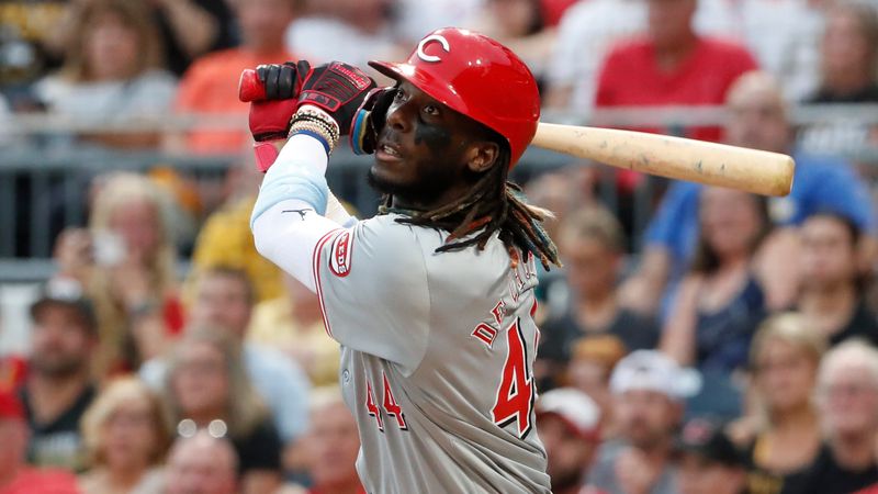 Jun 17, 2024; Pittsburgh, Pennsylvania, USA;  Cincinnati Reds shortstop Elly De La Cruz (44) hits a double against the Pittsburgh Pirates during the third inning at PNC Park. Mandatory Credit: Charles LeClaire-USA TODAY Sports