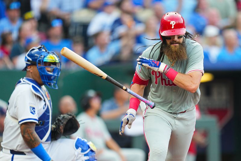 Aug 24, 2024; Kansas City, Missouri, USA; Philadelphia Phillies center fielder Brandon Marsh (16) reacts after hitting a pop fly against the Kansas City Royals to end the fourth inning at Kauffman Stadium. Mandatory Credit: Jay Biggerstaff-USA TODAY Sports