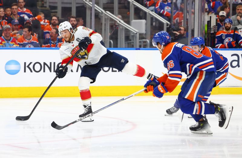 June 21, 2024; Edmonton, Alberta, CAN; Florida Panthers defenseman Brandon Montour (62) shoots against the Edmonton Oilers in the third period in game six of the 2024 Stanley Cup Final at Rogers Place. Mandatory Credit: Sergei Belski-USA TODAY Sports