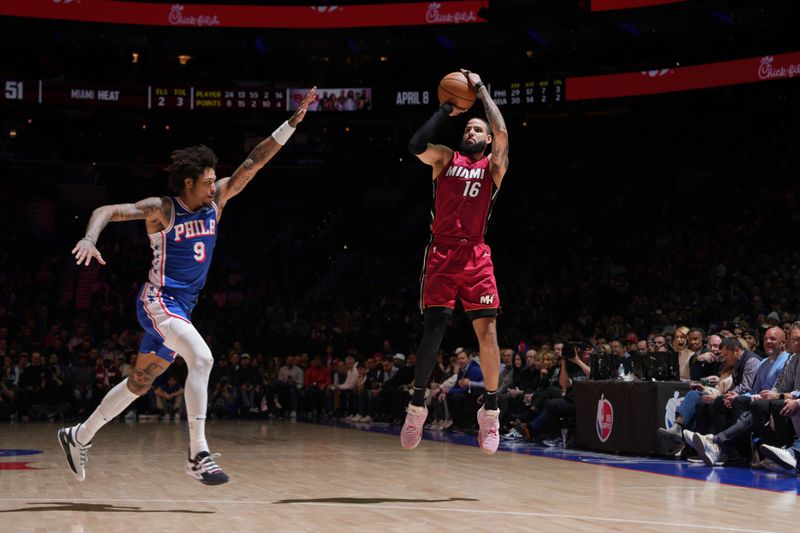 PHILADELPHIA, PA - MARCH 18: Caleb Martin #16 of the Miami Heat shoots a three point basket during the game against the Philadelphia 76ers on March 18, 2024 at the Wells Fargo Center in Philadelphia, Pennsylvania NOTE TO USER: User expressly acknowledges and agrees that, by downloading and/or using this Photograph, user is consenting to the terms and conditions of the Getty Images License Agreement. Mandatory Copyright Notice: Copyright 2024 NBAE (Photo by Jesse D. Garrabrant/NBAE via Getty Images)